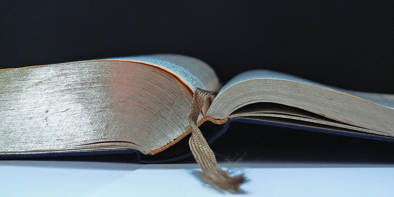 Close up of an open book's spine